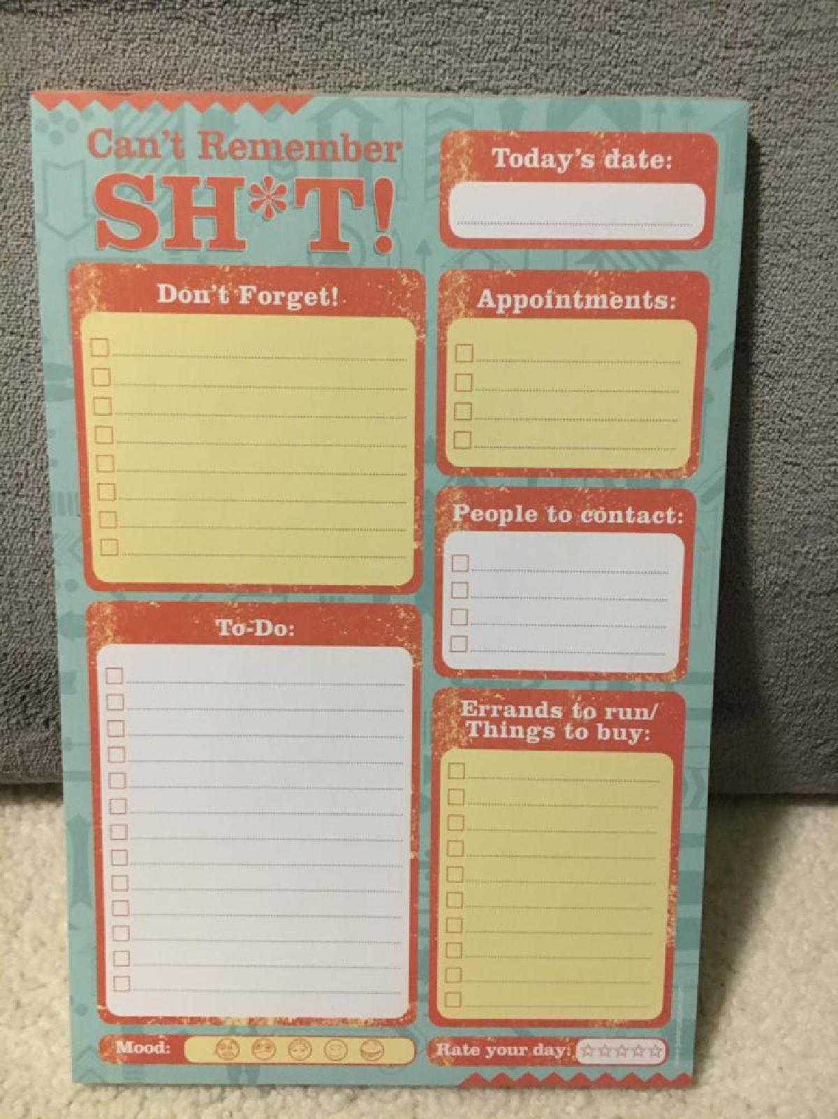 A notepad with blocks carved out for various tasks and a title 'I can't remember sh*t!'