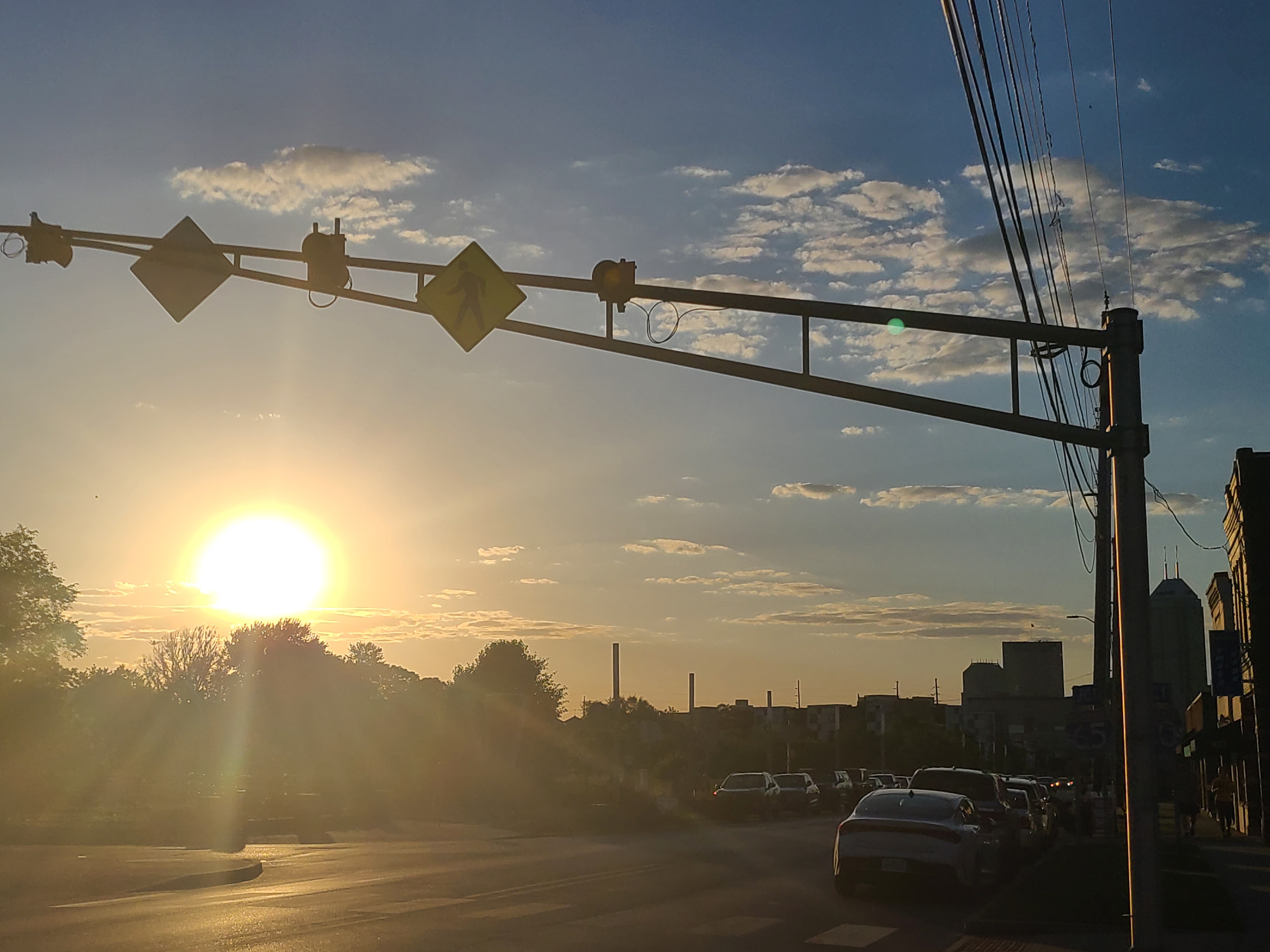 sun getting close to setting and a clear blue sky